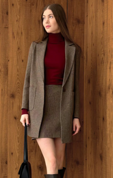 a lady in a red sweater and a Khaki suit made of wool